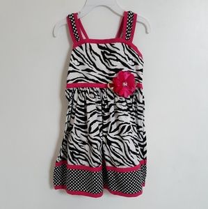 Pretty dress with zebra pattern and polka dots